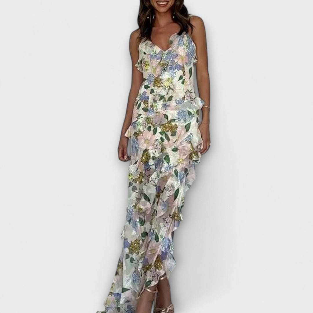 Abril | Vestido maxi con volantes al viento