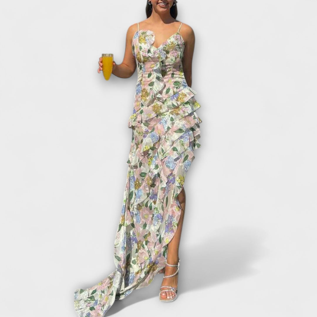 Abril | Vestido maxi con volantes al viento