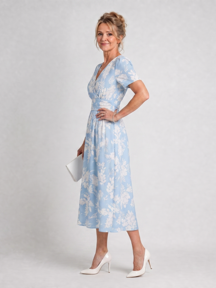 Esperanza | Vestido midi con flores sobre azul claro