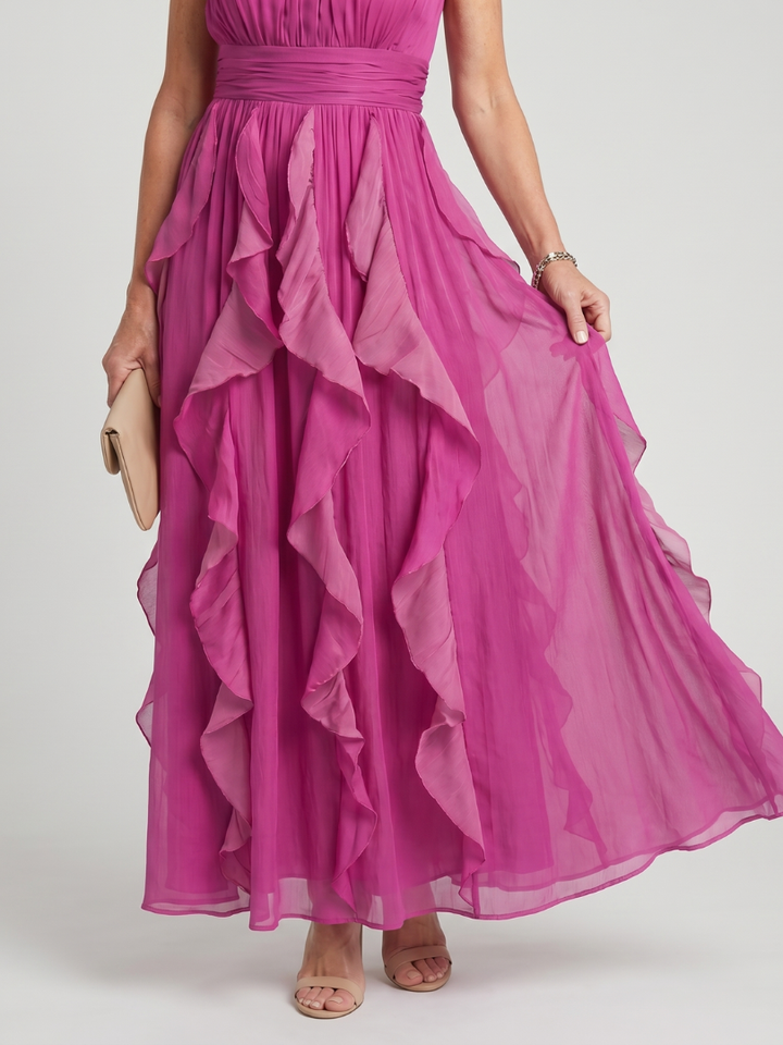 Pilar | Vestido largo magenta con volantes