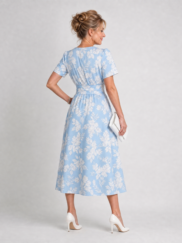 Esperanza | Vestido midi con flores sobre azul claro