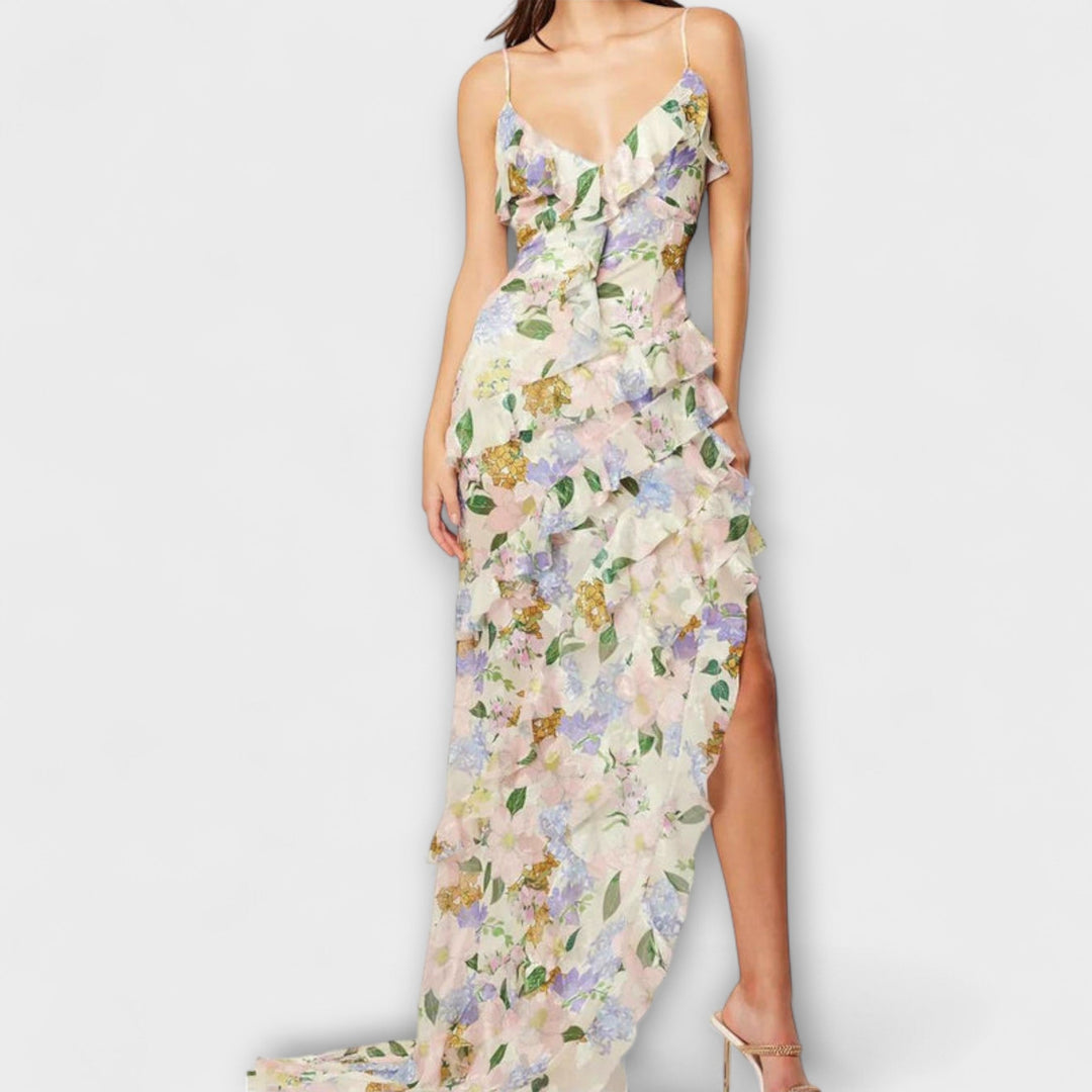Abril | Vestido maxi con volantes al viento