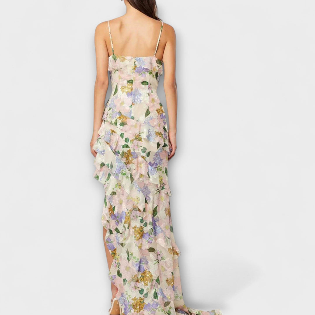 Abril | Vestido maxi con volantes al viento