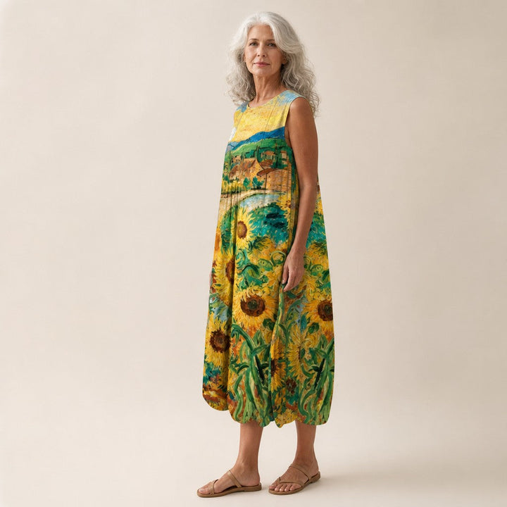 Amaya | Vestido midi sin mangas con campo de girasoles