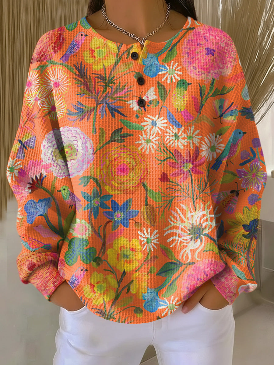 Julia | Jersey naranja con flores