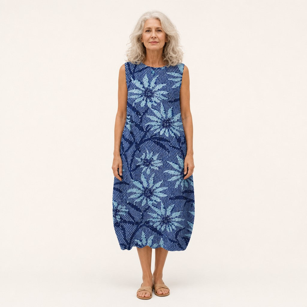 Lucía | Vestido midi sin mangas con espirales sobre azul oscuro