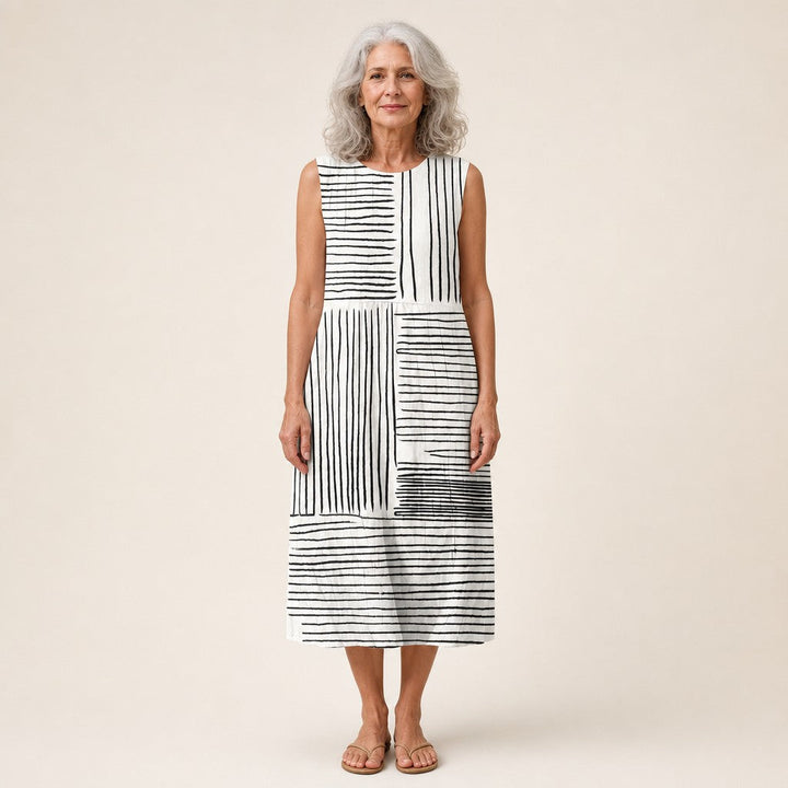 Itziar | Vestido midi sin mangas con líneas en blanco y negro