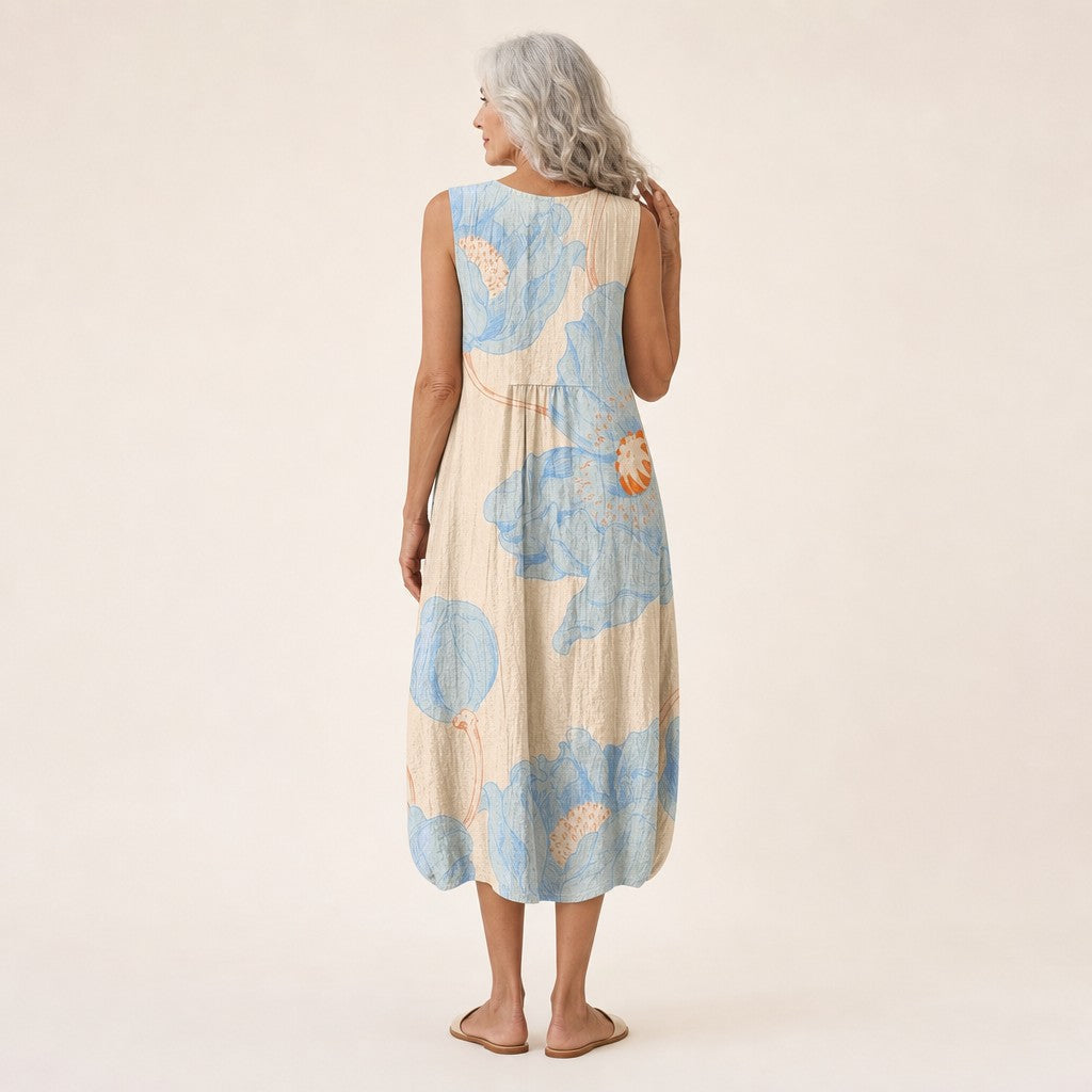 Daniela | Vestido midi sin mangas con flores azules sobre crema