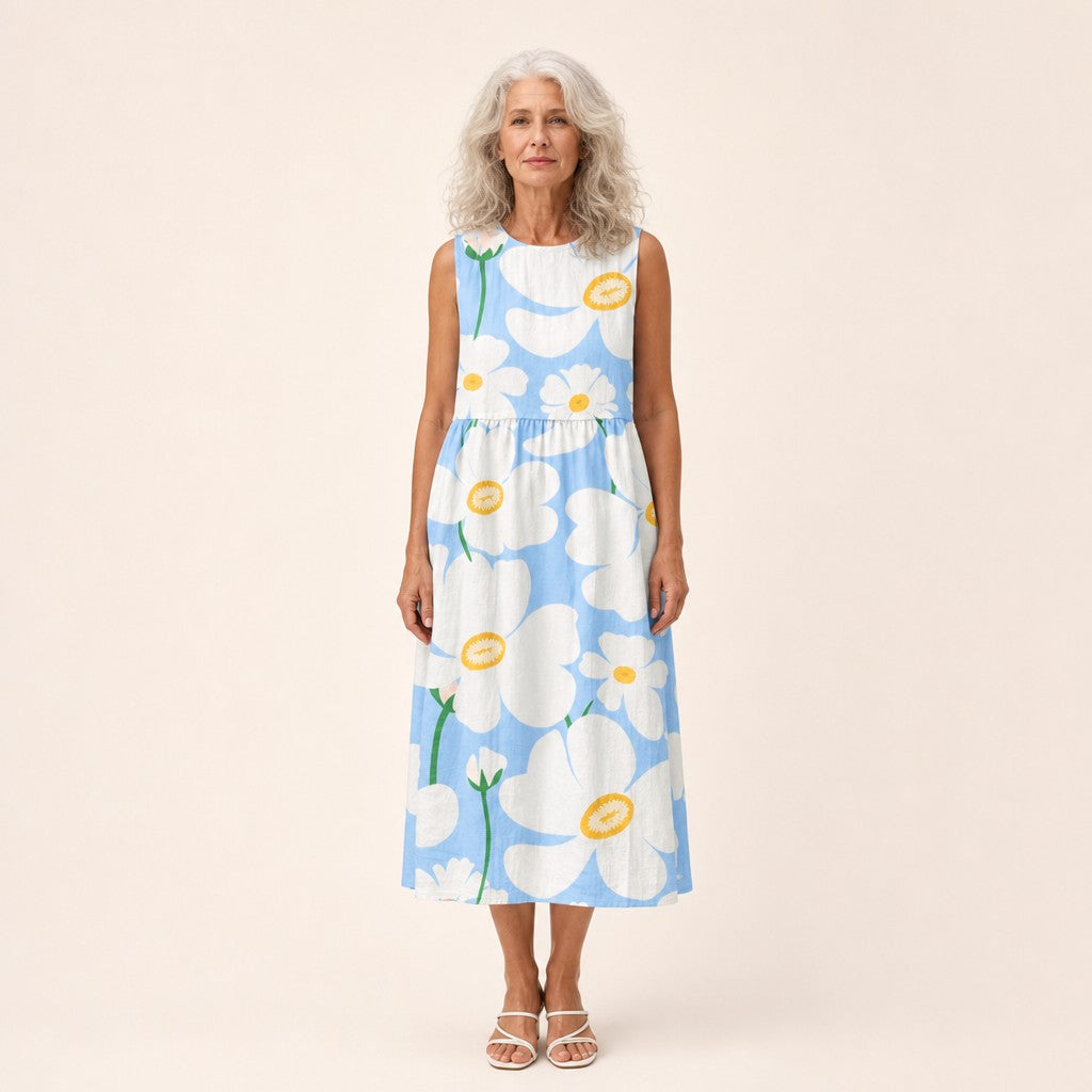 Adriana | Vestido midi sin mangas con flores blancas sobre azul claro