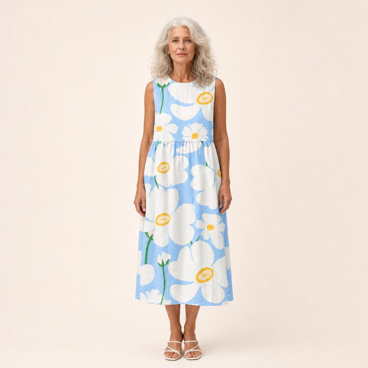 Adriana | Vestido midi sin mangas con flores blancas sobre azul claro