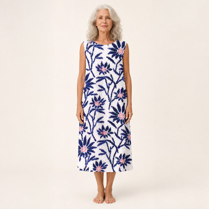 Araceli | Vestido midi sin mangas con ramas azules sobre blanco