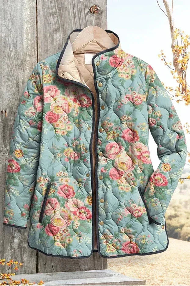 Rocío | Chaqueta acolchada azul celeste con estampado de rosas