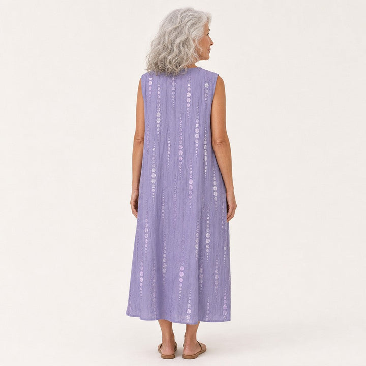 Julia | Vestido midi sin mangas en lila con puntos verticales