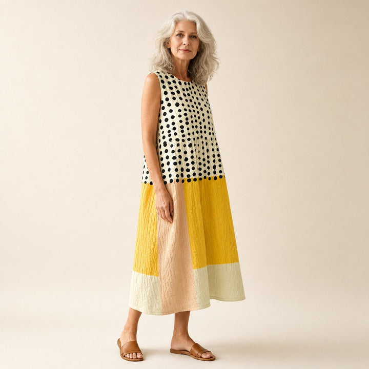 Alba | Vestido midi sin mangas con lunares y bloques de color