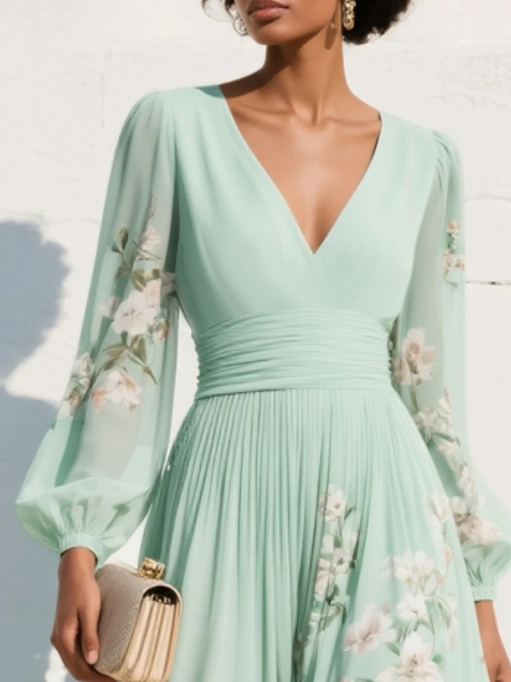 Ariadna | Vestido midi de gasa verde con escote en V y flores bordadas