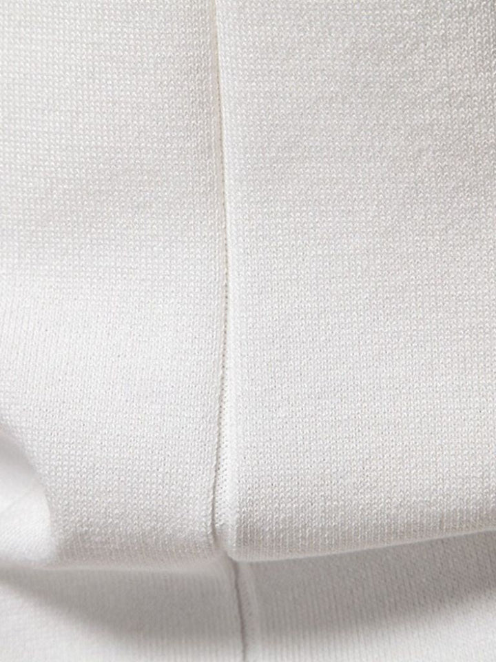 Amancio | Polo de punto camel con cuello de cremallera