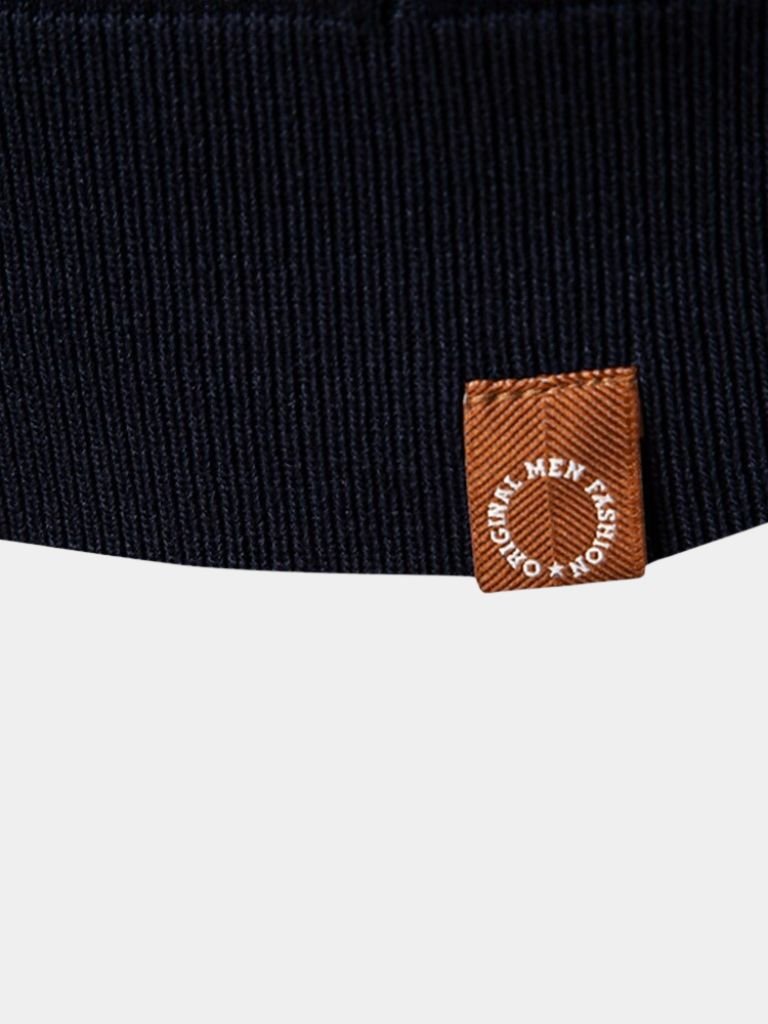 Amancio | Polo de punto camel con cuello de cremallera