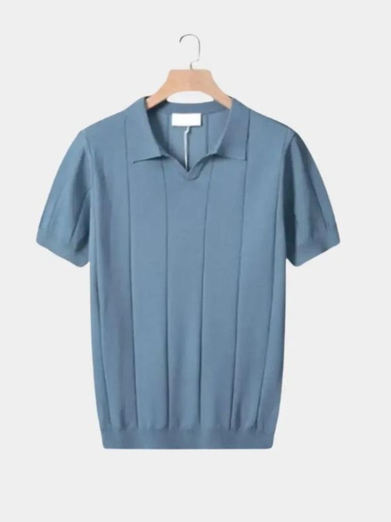 Antolín | Polo azul texturizado con cuello abierto
