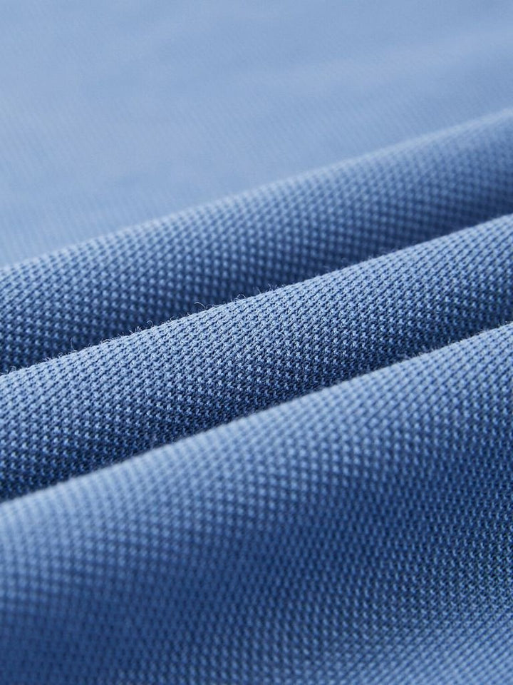Apolinar | Polo azul con cremallera corta