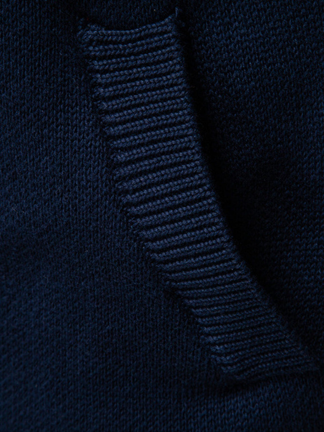 Bonifacio | Jersey jacquard con motivo geométrico, cuello alto y cremallera