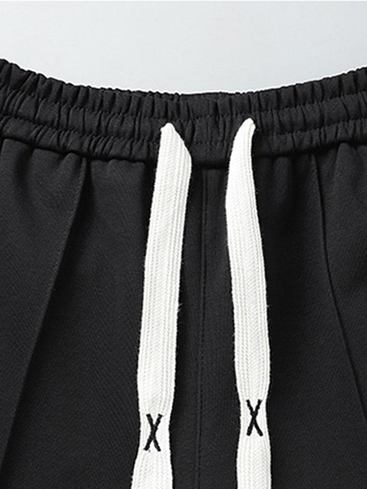 Delfín | Pantalón jogger con raya marcada