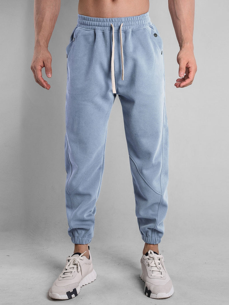 Edmundo | Pantalón jogger con bolsillos abotonados
