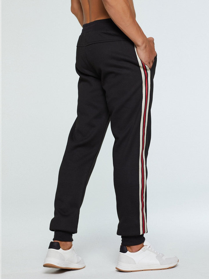 Gastón | Pantalón jogger forrado de borreguito con banda lateral