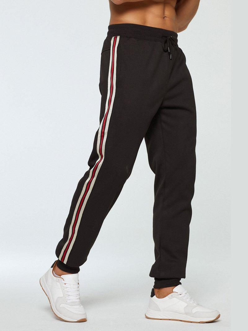 Gastón | Pantalón jogger forrado de borreguito con banda lateral