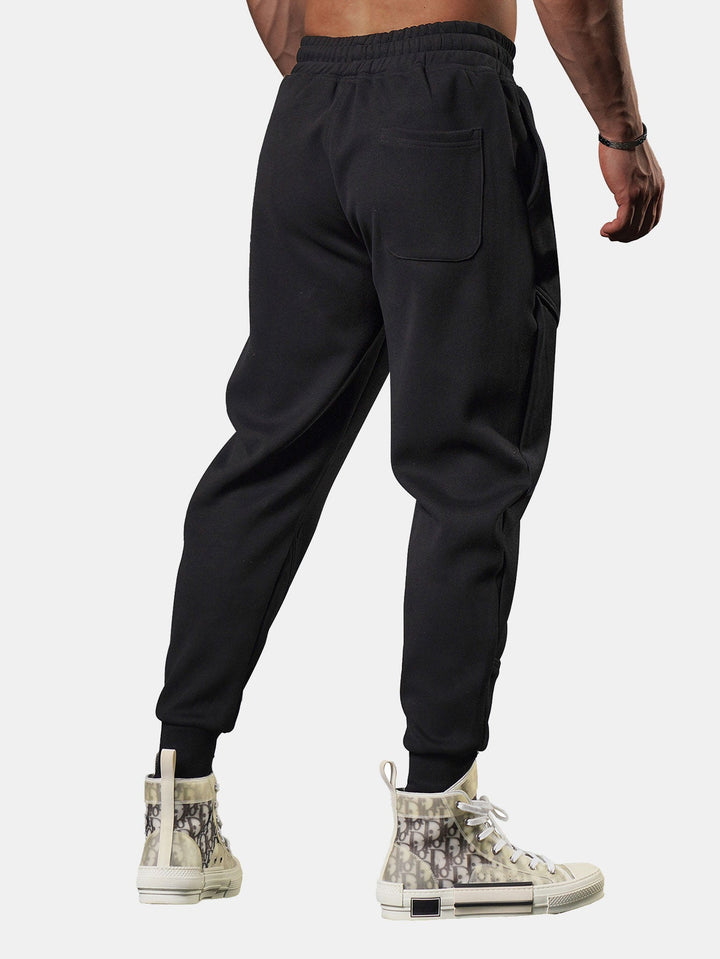 Guzmán | Pantalón jogger cropped con abertura lateral