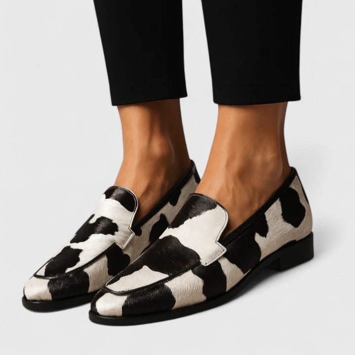 Lorena | Mocasines con estampado de vaca bicolor