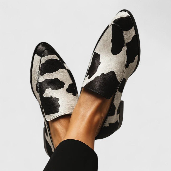 Lorena | Mocasines con estampado de vaca bicolor