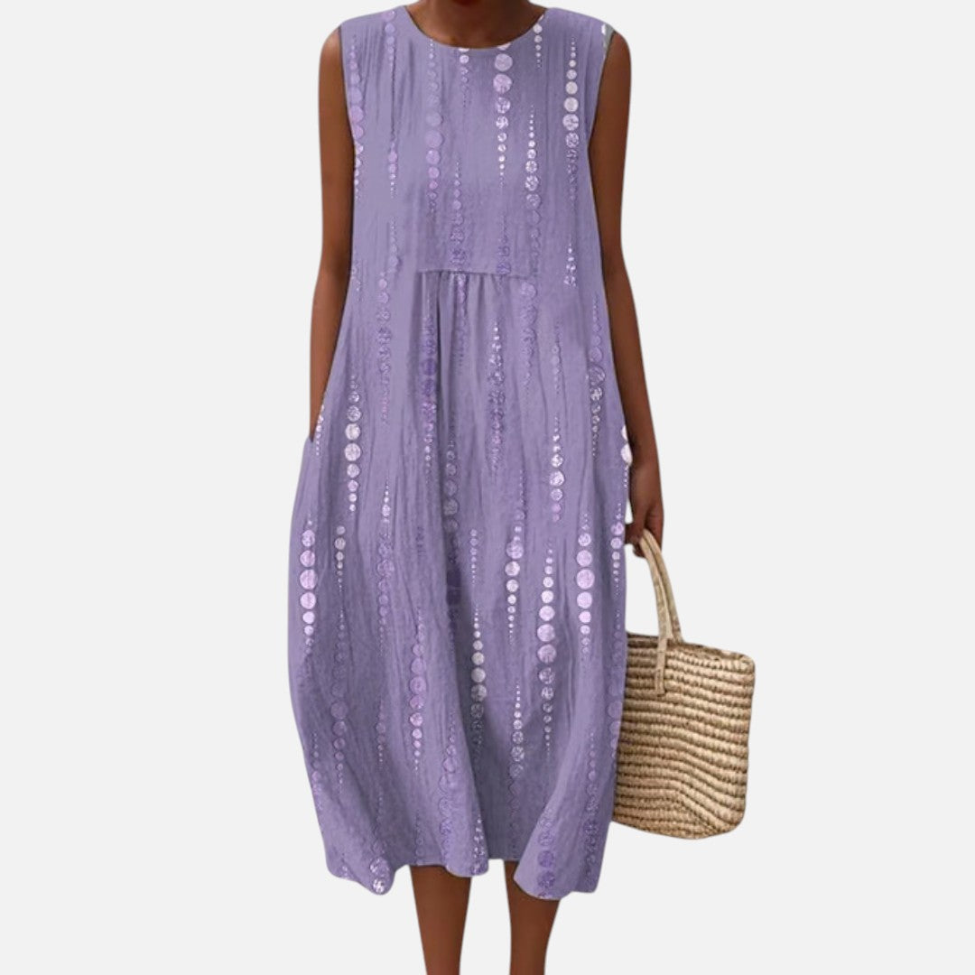 Julia | Vestido midi sin mangas en lila con puntos verticales