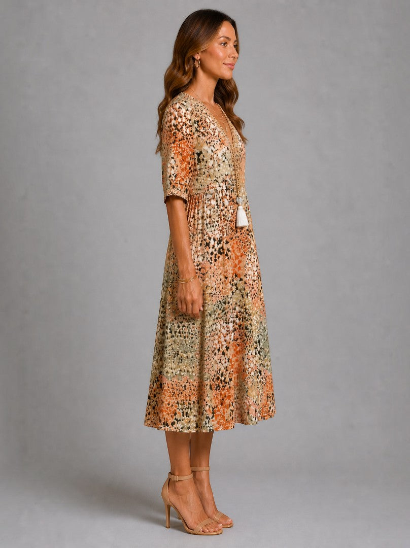 Aitana | Vestido midi con motivo floral en ocre