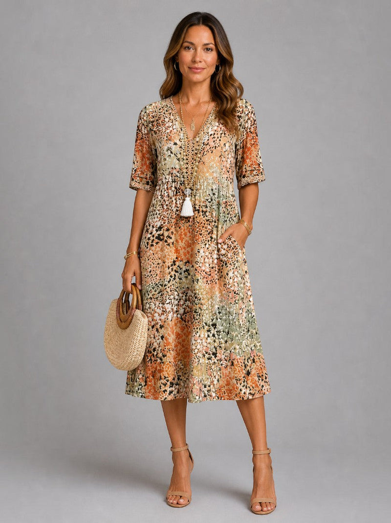 Aitana | Vestido midi con motivo floral en ocre