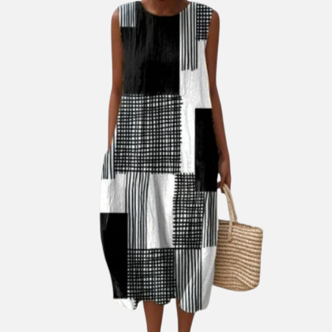 Irene | Vestido midi sin mangas con patchwork en blanco y negro