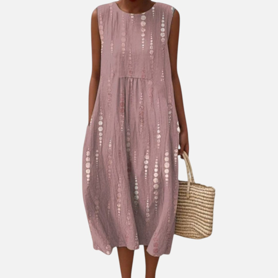 Consuelo | Vestido midi sin mangas en rosa palo con puntos