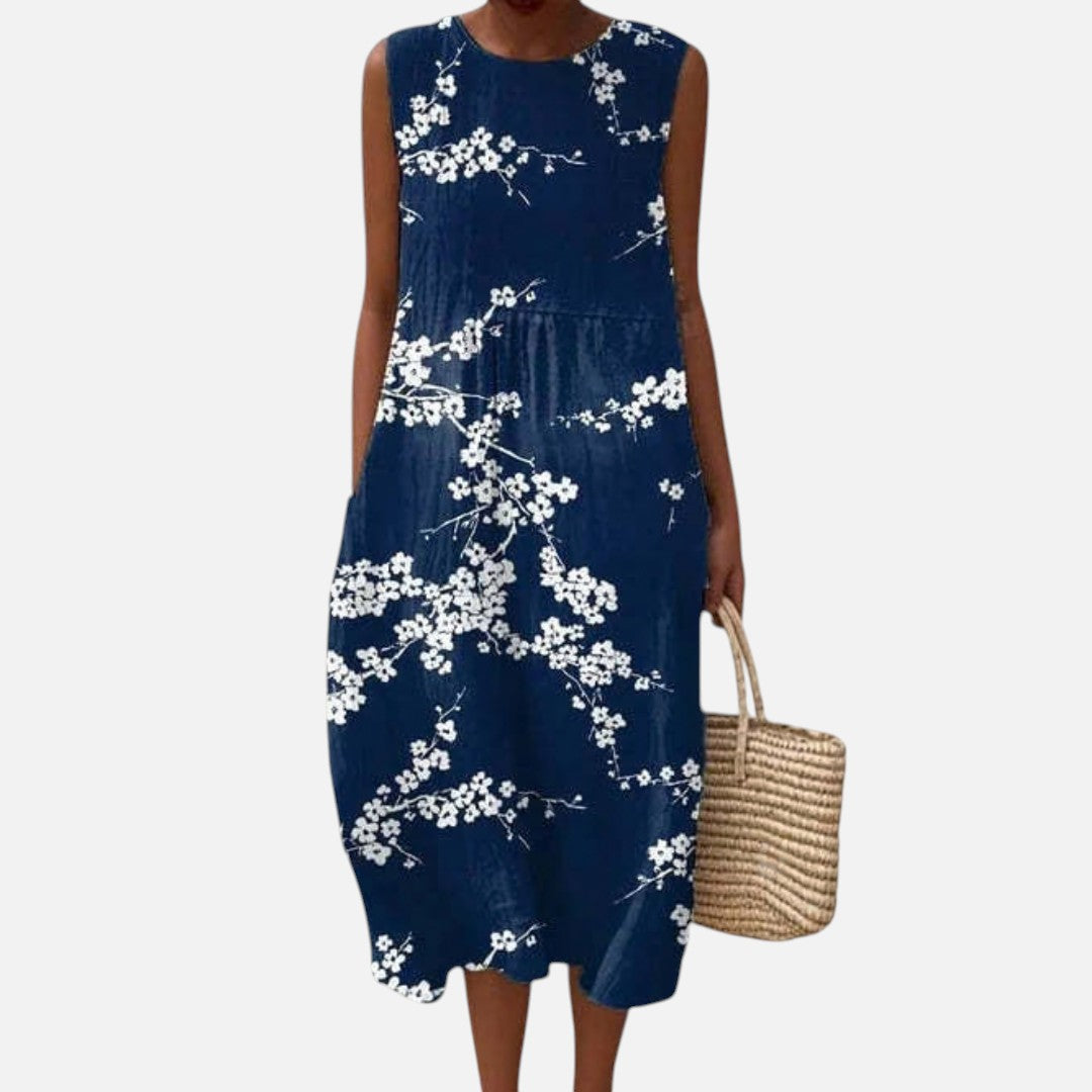 Fernanda | Vestido midi sin mangas con flor de cerezo sobre azul marino