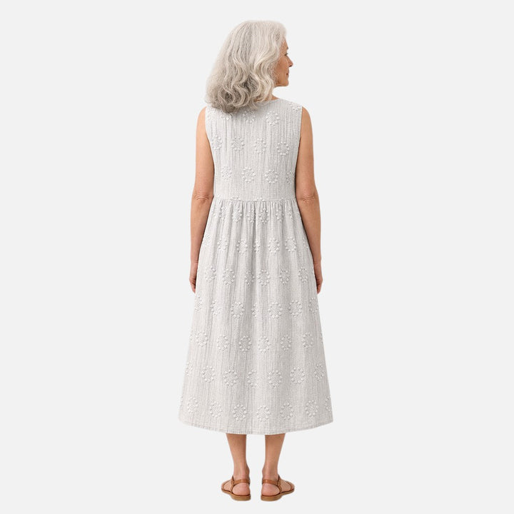 Concha | Vestido midi sin mangas en blanco con textura floral