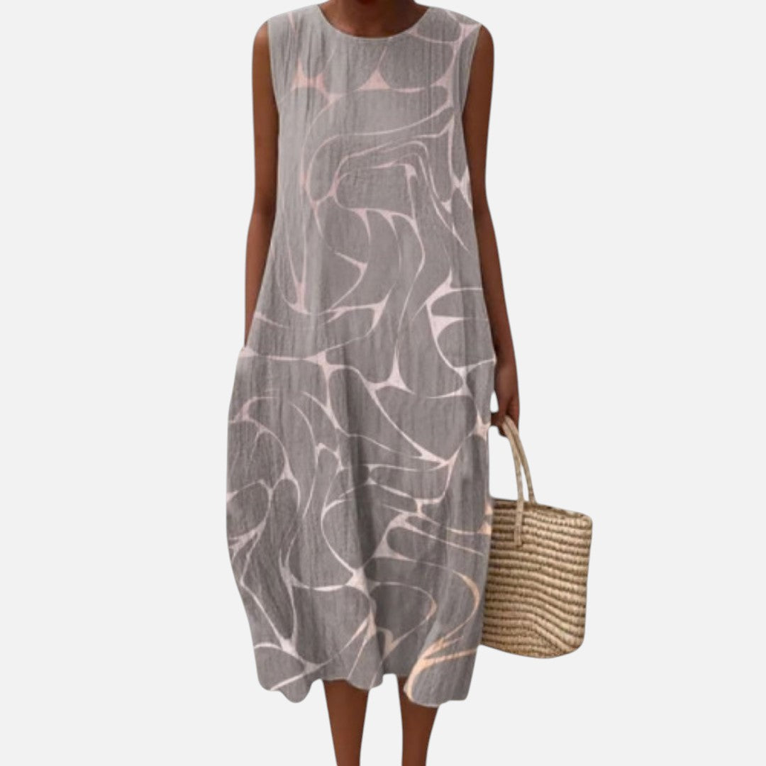 Fátima | Vestido midi sin mangas con golondrinas abstractas