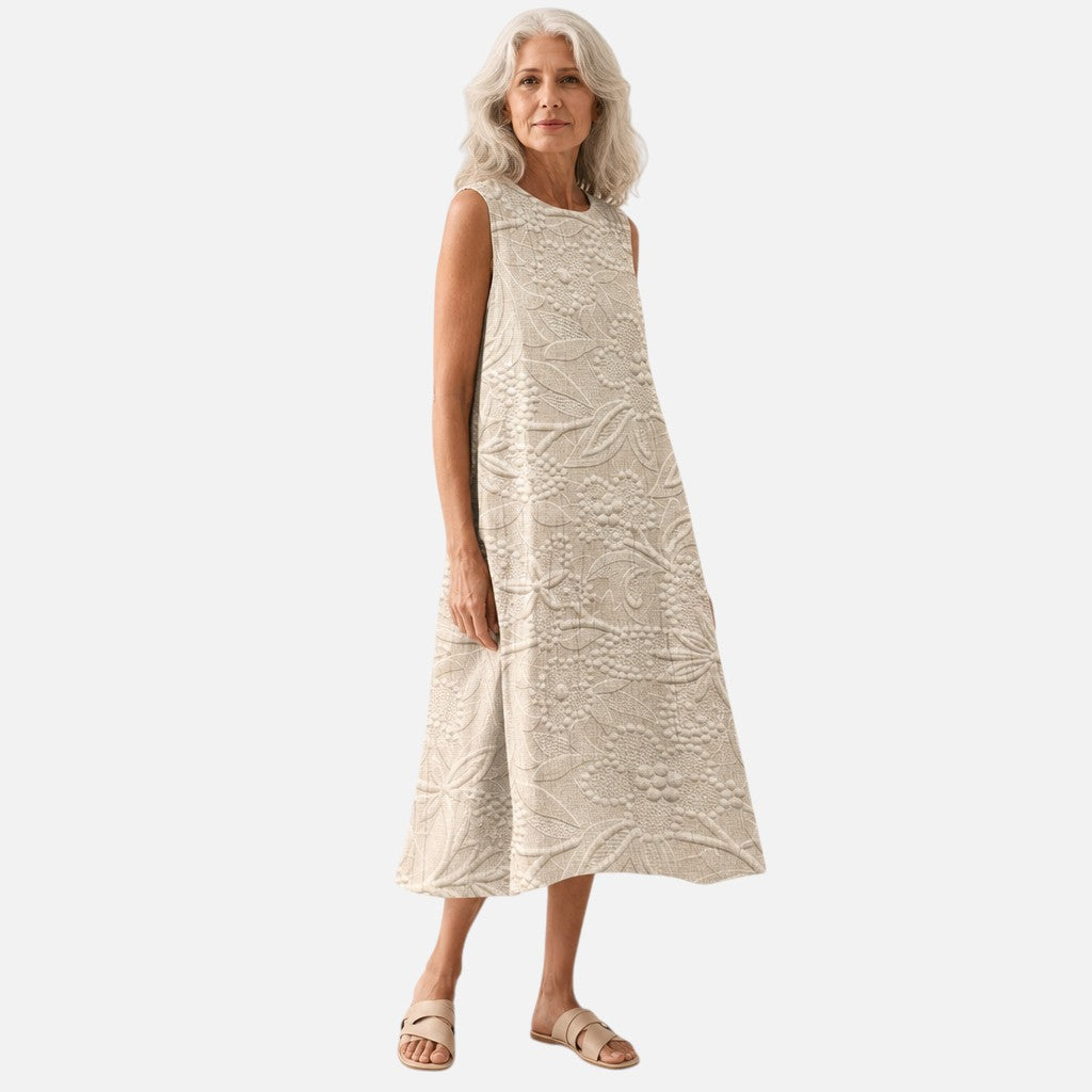 Mónica | Vestido midi sin mangas en crema con relieve de hojas