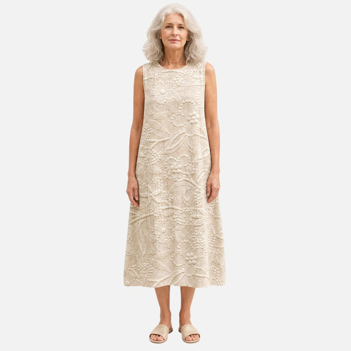 Mónica | Vestido midi sin mangas en crema con relieve de hojas