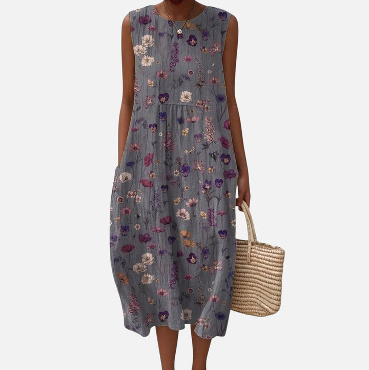 Gloria | Vestido midi sin mangas con florecillas sobre gris