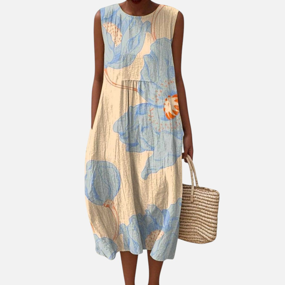 Daniela | Vestido midi sin mangas con flores azules sobre crema