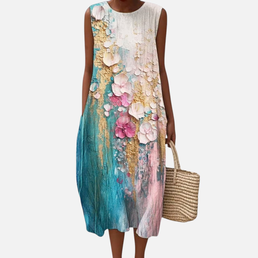 Margarita | Vestido midi sin mangas con flores rosas sobre turquesa