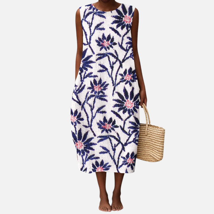Araceli | Vestido midi sin mangas con ramas azules sobre blanco