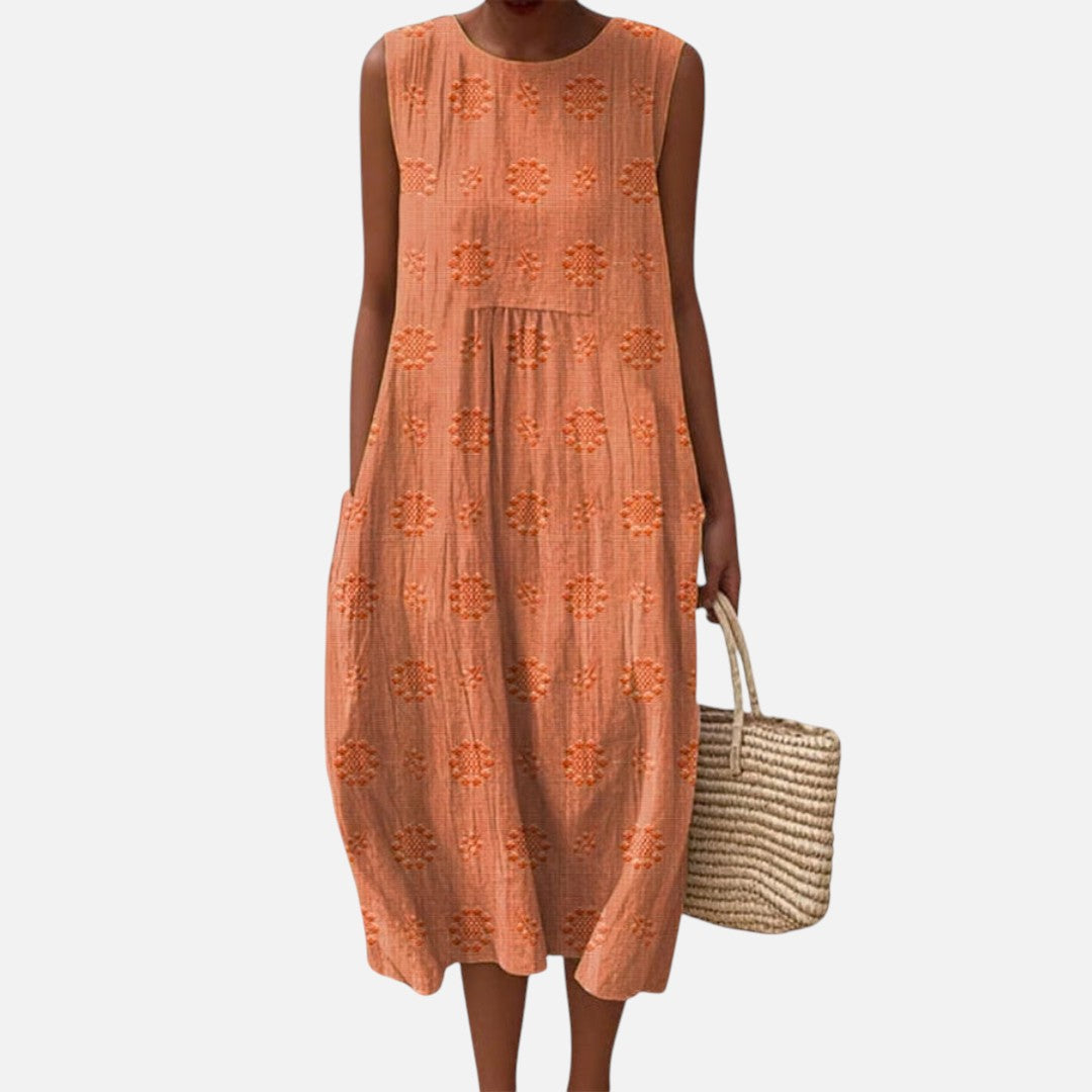 Flora | Vestido midi sin mangas en naranja albaricoque