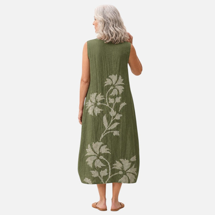 Leticia | Vestido midi sin mangas en verde oliva con ramas blancas