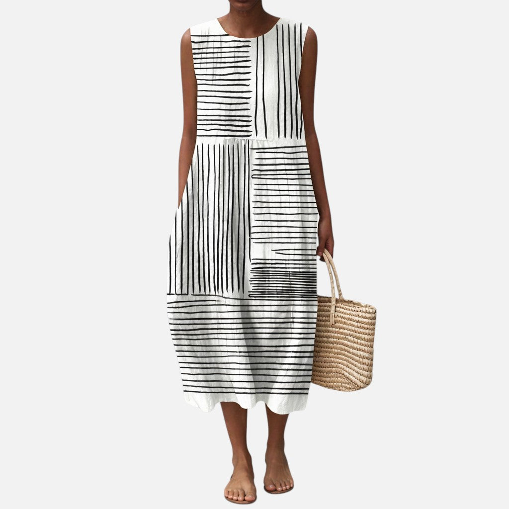 Catalina | Vestido midi sin mangas de rayas en blanco y negro