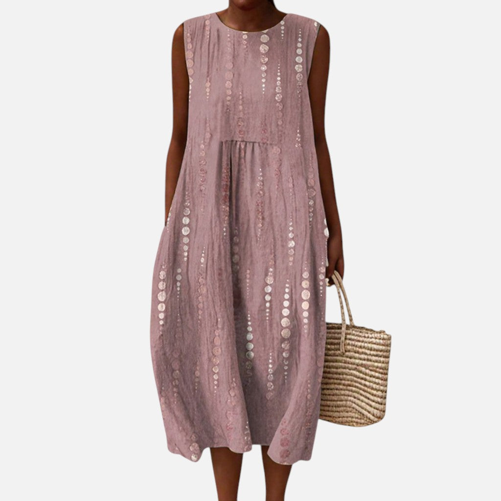 Marcela | Vestido midi sin mangas en rosa palo con lunares verticales