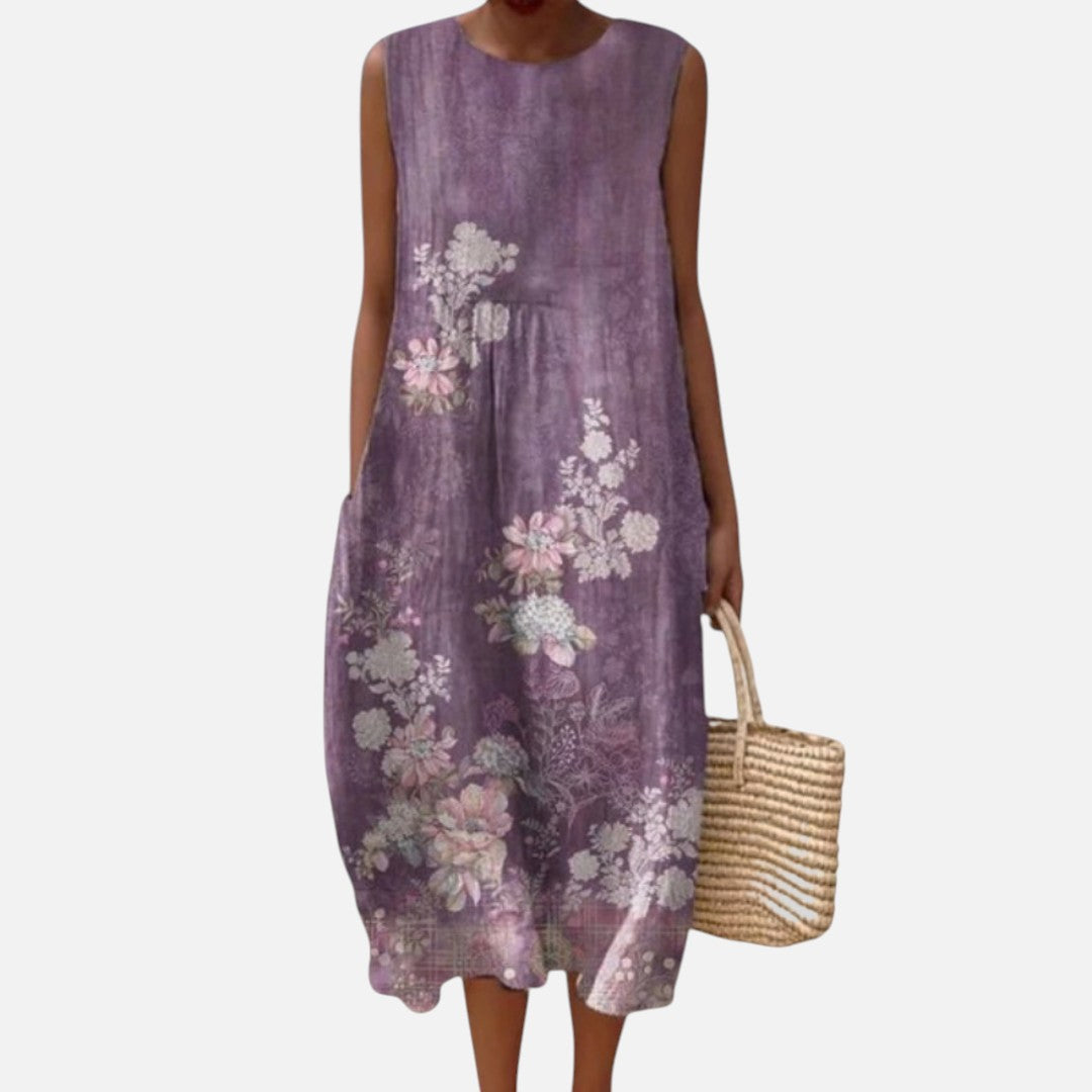 Belén | Vestido midi sin mangas con flores sobre morado